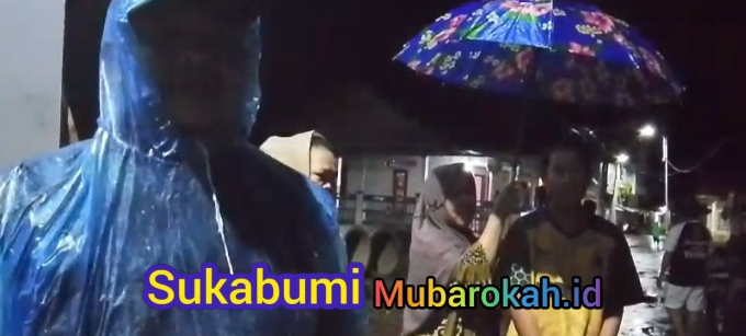 Jaro Midun Hadir di Tengah Deras Hujan: Kepedulian Pemimpin Cikahuripan Saat Banjir Melanda