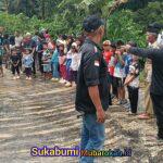 Santunan Warga Warnai Peresmian Jalan Kampung Mandala Sukabumi oleh H. Isep Dadang Sukmana